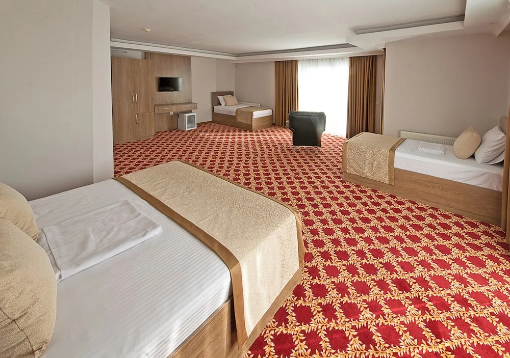 Deluxe Dört Kişilik Oda