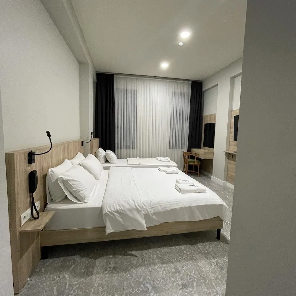 Deluxe Üç Kişilik Oda