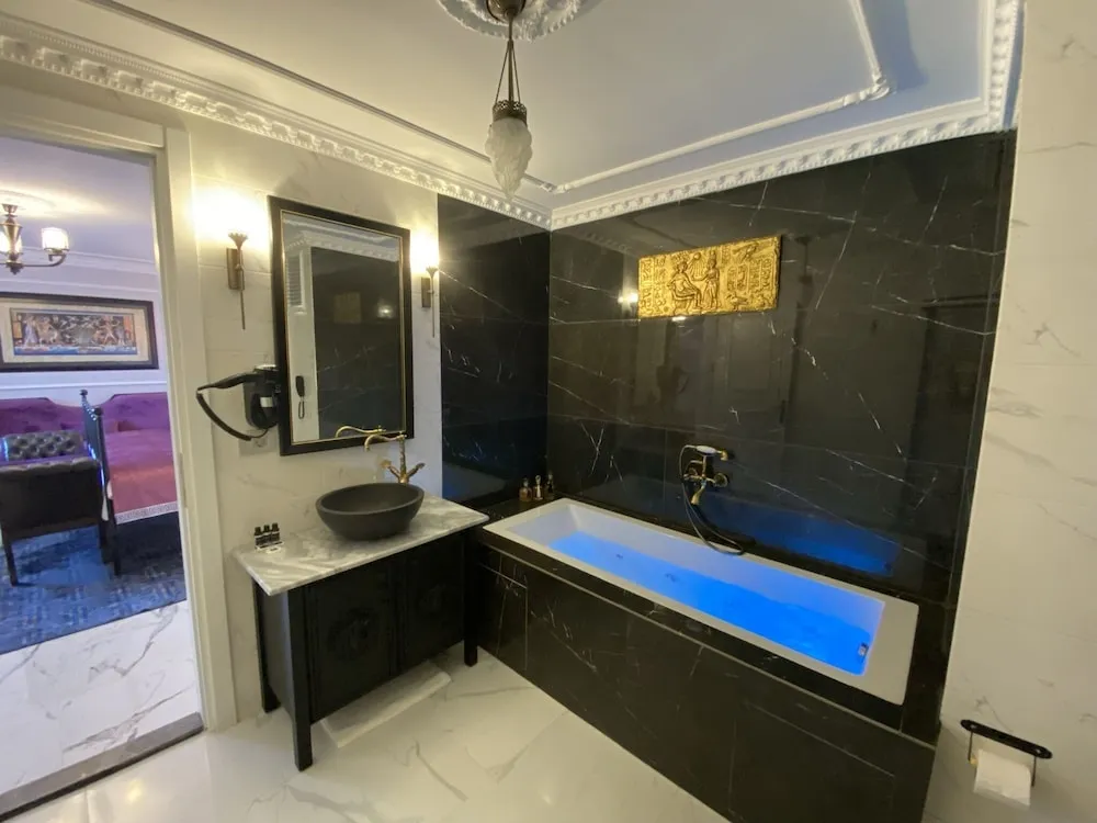 Deluxe Tek Büyük veya İki Ayrı Yataklı Oda