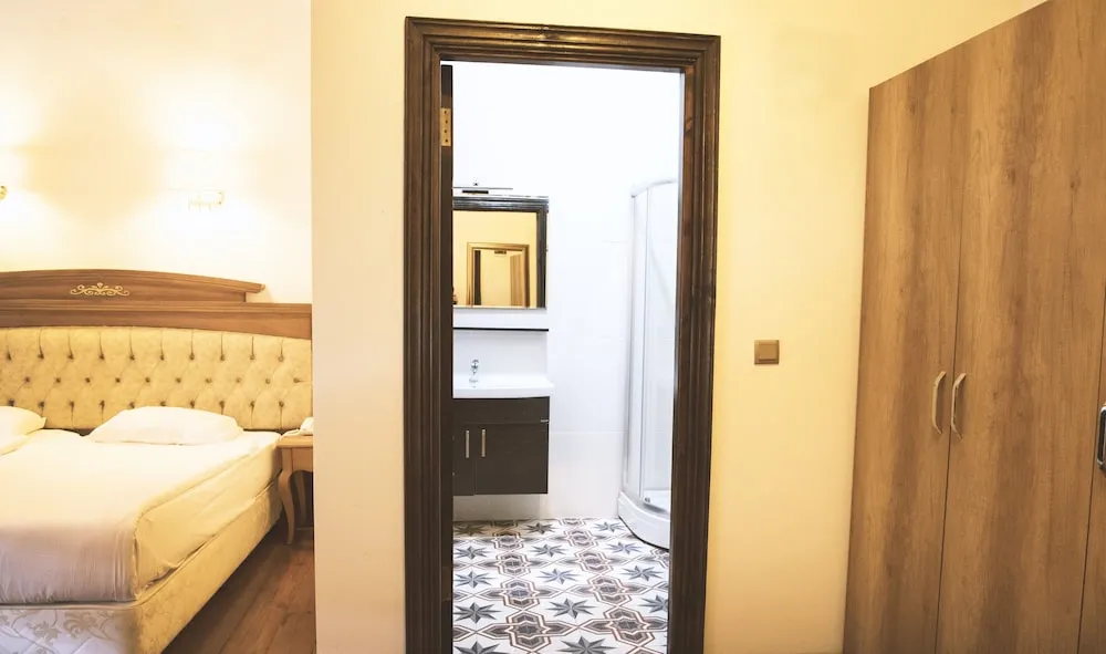 Deluxe Tek Büyük veya İki Ayrı Yataklı Oda
