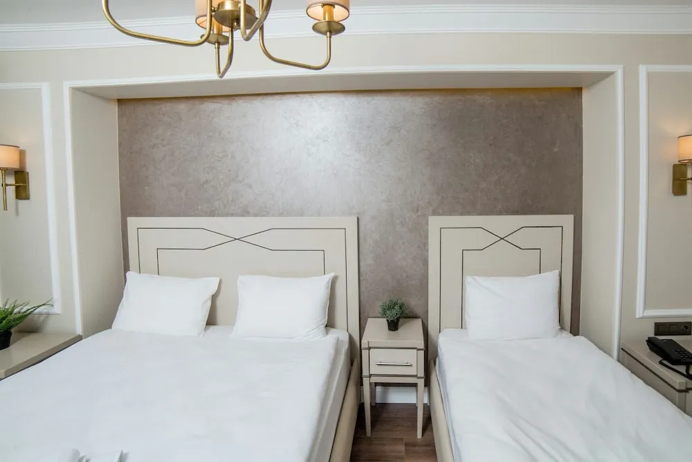 Deluxe Üç Kişilik Oda