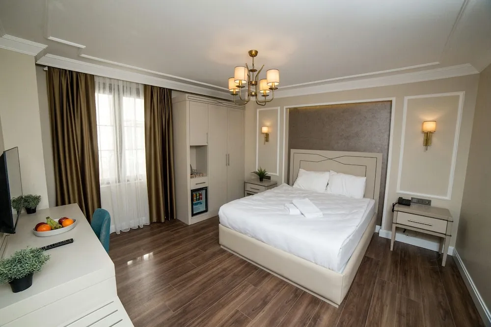 Deluxe Tek Büyük Yataklı Oda