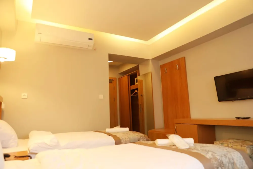 City Üç Kişilik Oda