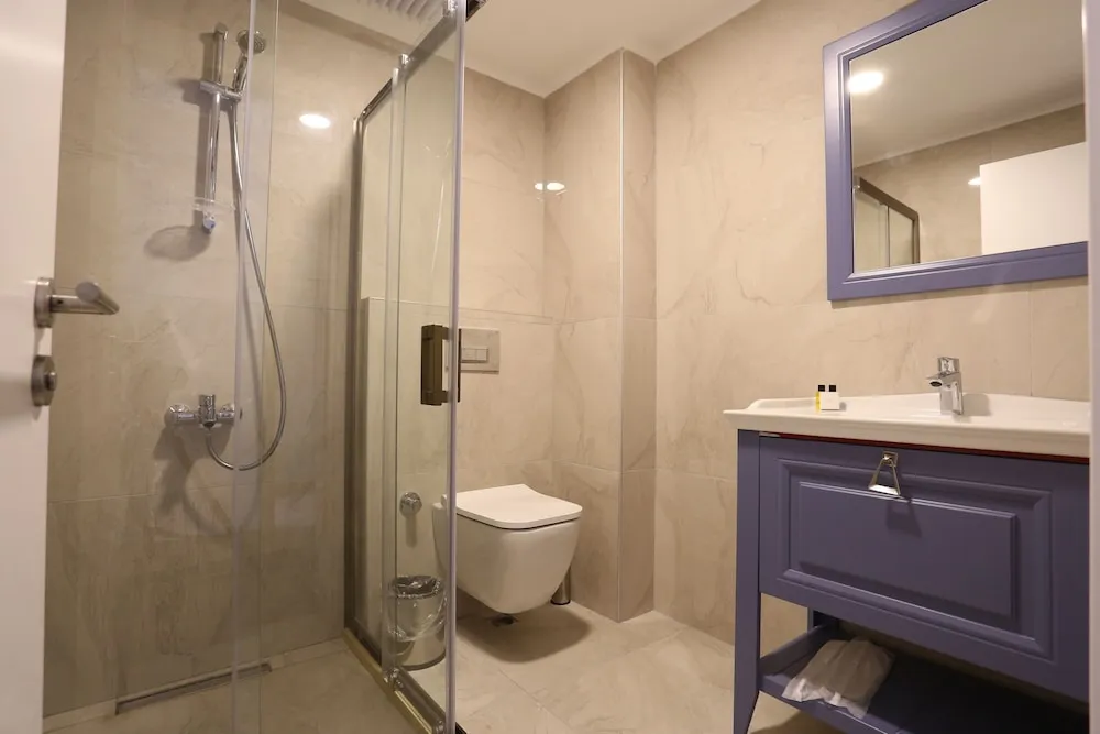 Deluxe Tek Büyük veya İki Ayrı Yataklı Oda, 1 Büyük (Queen) Boy Yatak, Sigara İçilmez, Balkon