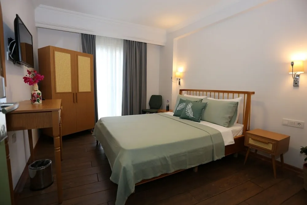 Deluxe Tek Büyük veya İki Ayrı Yataklı Oda, 1 Büyük (Queen) Boy Yatak, Sigara İçilmez, Balkon