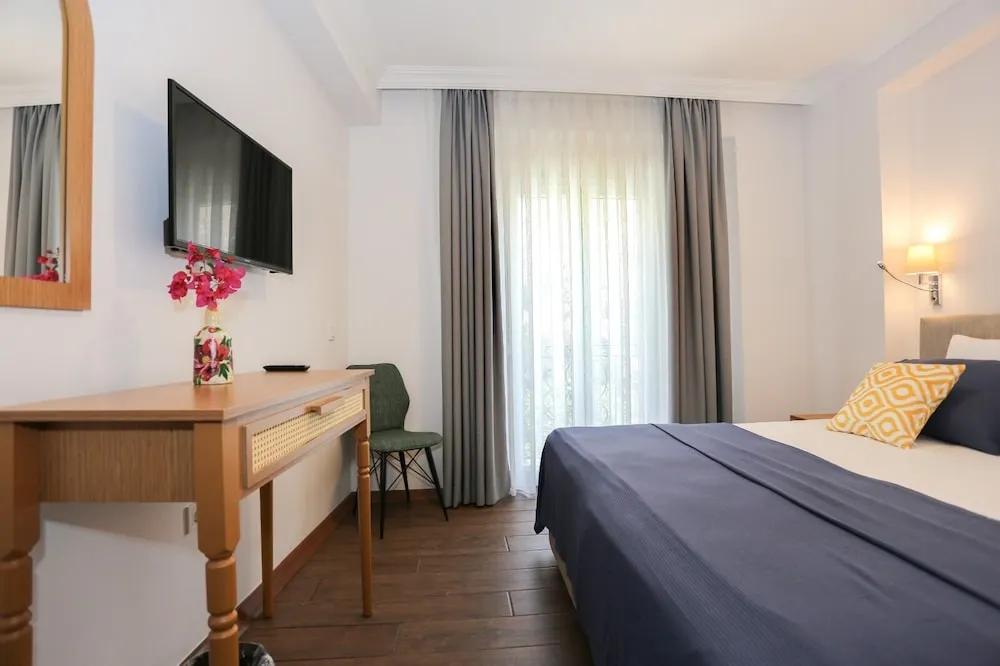 Deluxe Tek Büyük veya İki Ayrı Yataklı Oda, 1 Büyük (Queen) Boy Yatak, Sigara İçilmez, Balkon