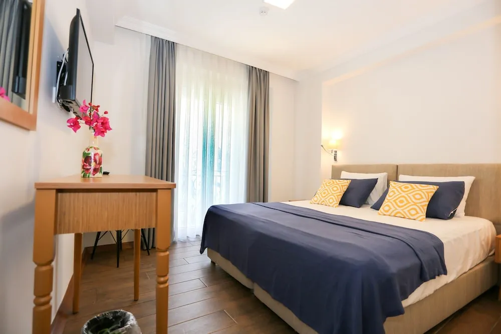 Deluxe Tek Büyük veya İki Ayrı Yataklı Oda, 1 Büyük (Queen) Boy Yatak, Sigara İçilmez, Balkon