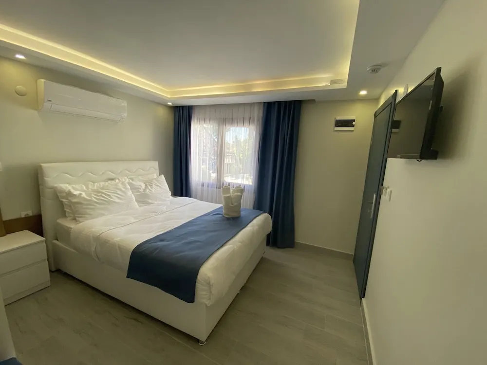Standard Üç Kişilik Oda, Bahçe Manzaralı