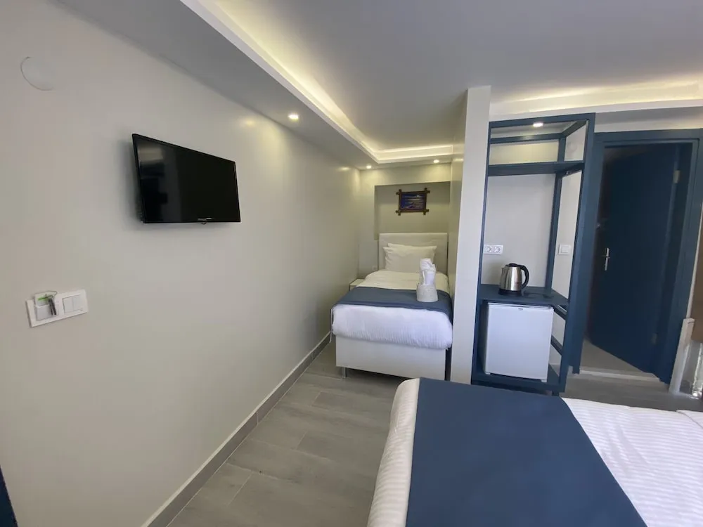 Standard Üç Kişilik Oda, Bahçe Manzaralı