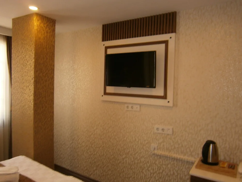 Deluxe Üç Kişilik Oda