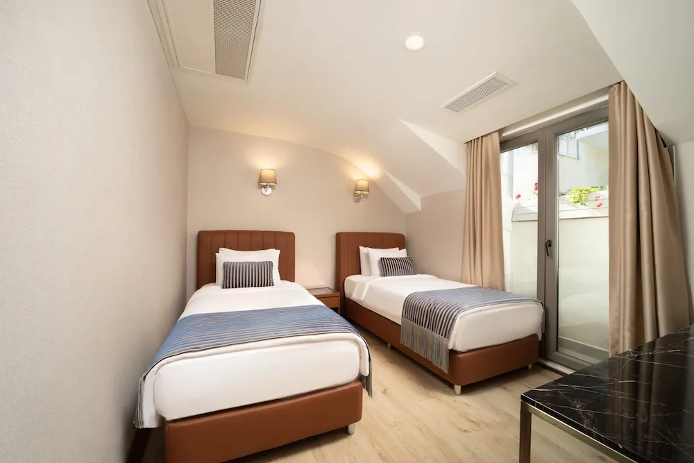 King Suite, 1 En Buyuk(King), Boy Yatak ve Cekyat, Sigara Icilmez