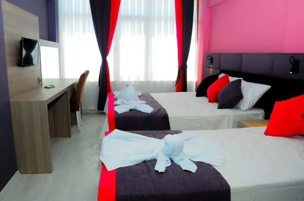 Deluxe Üç Kişilik Oda
