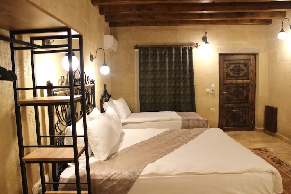 Deluxe Üç Kişilik Oda