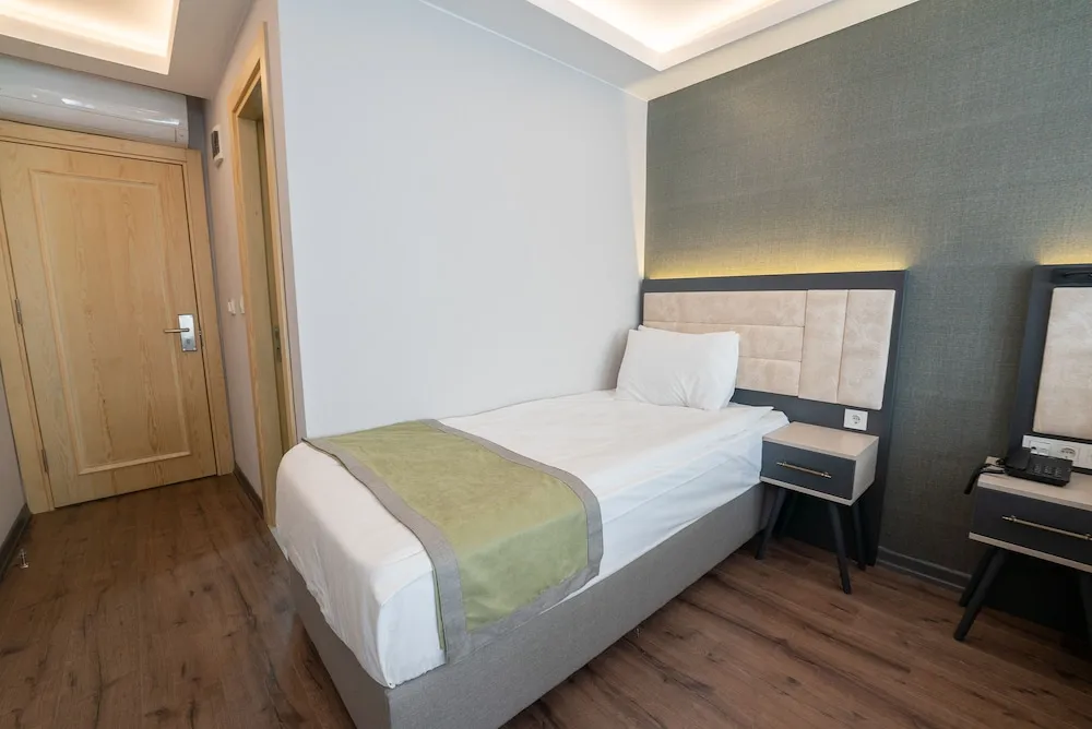 Deluxe Üç Kişilik Oda