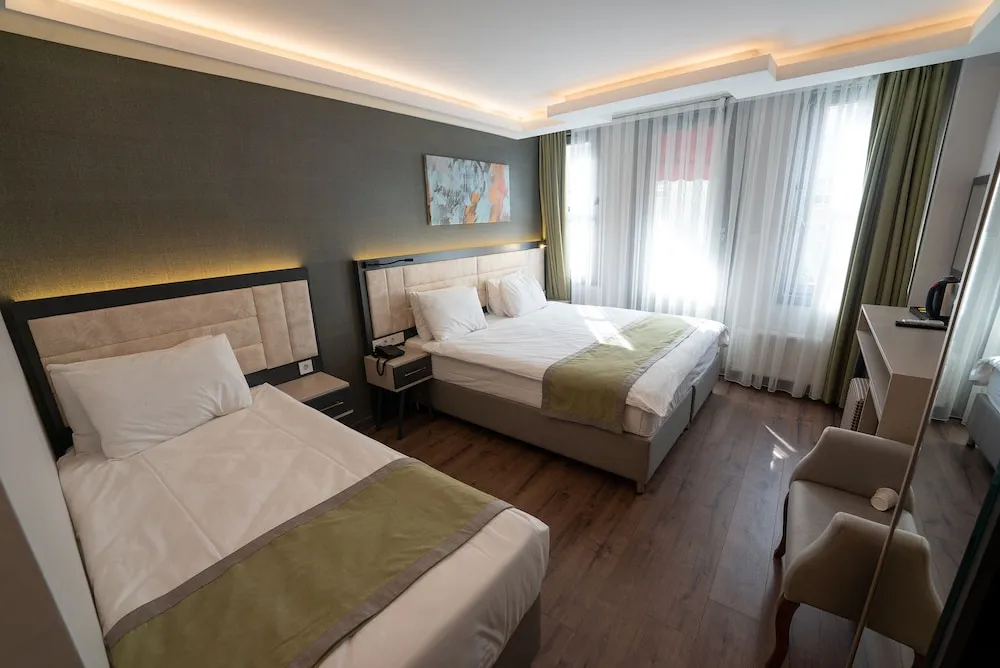Deluxe Üç Kişilik Oda