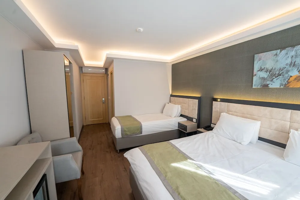 Deluxe Üç Kişilik Oda