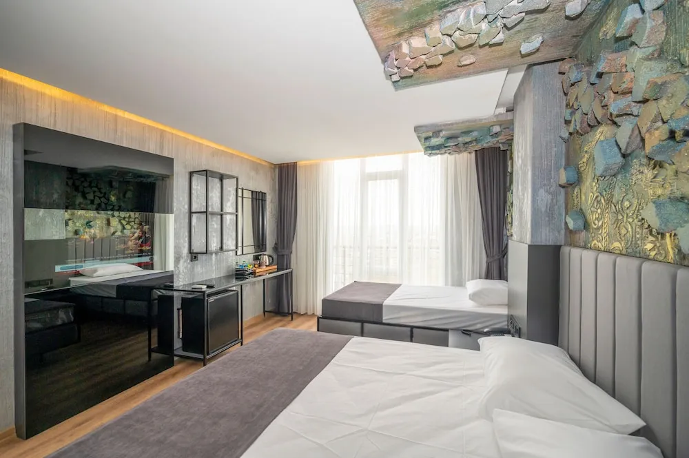 Deluxe Üç Kişilik Oda