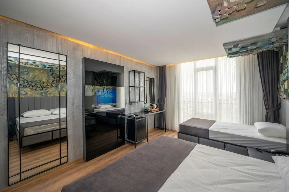 Deluxe Üç Kişilik Oda
