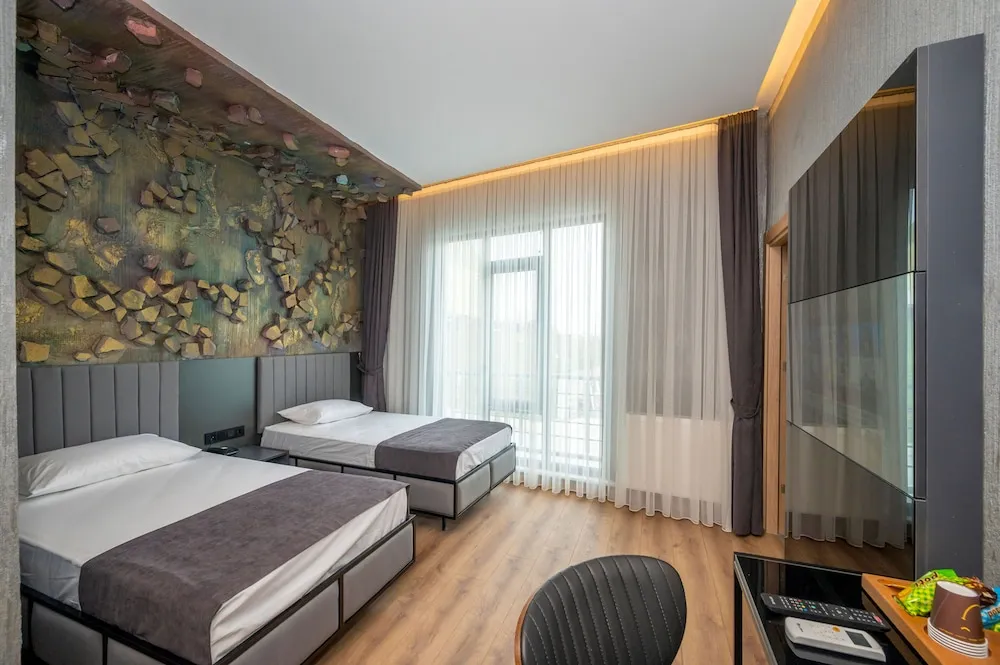 Deluxe Üç Kişilik Oda