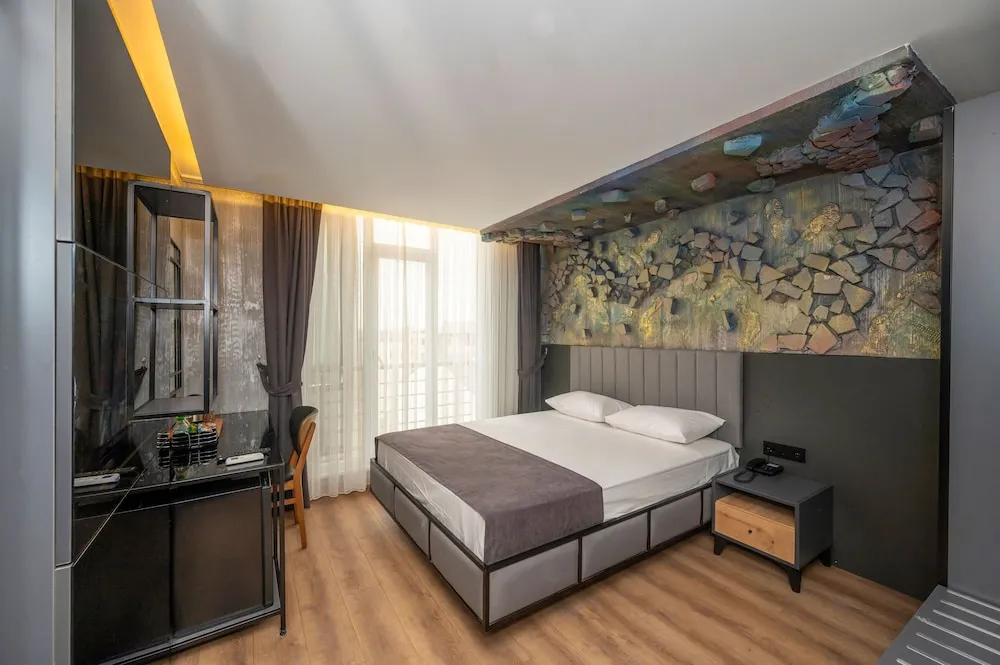Deluxe Tek Büyük veya İki Ayrı Yataklı Oda