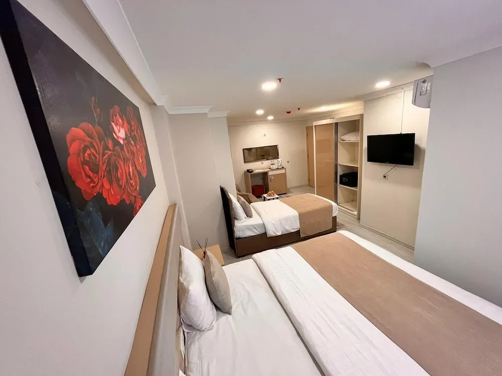 Economy Üç Kişilik Oda