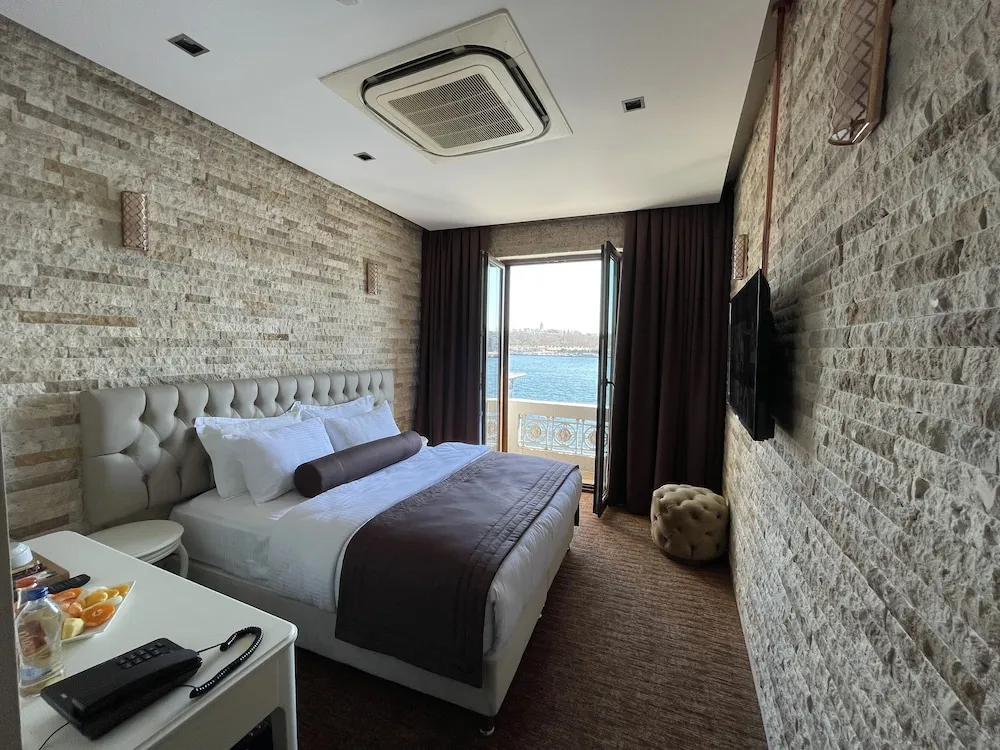 Deluxe Tek Büyük veya İki Ayrı Yataklı Oda