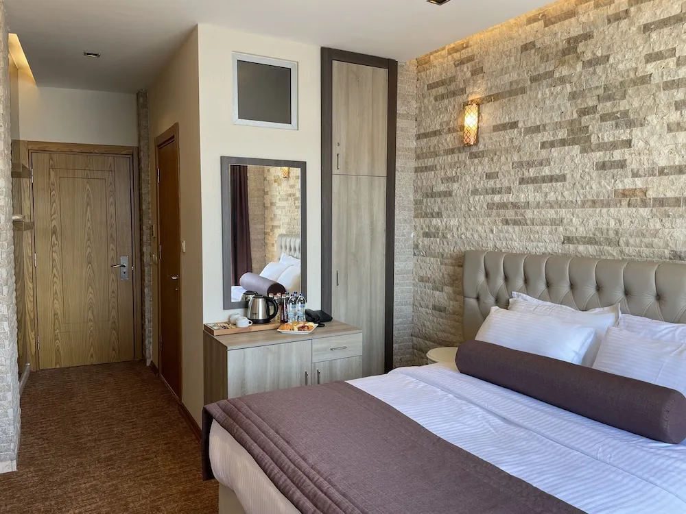 Deluxe Tek Büyük veya İki Ayrı Yataklı Oda
