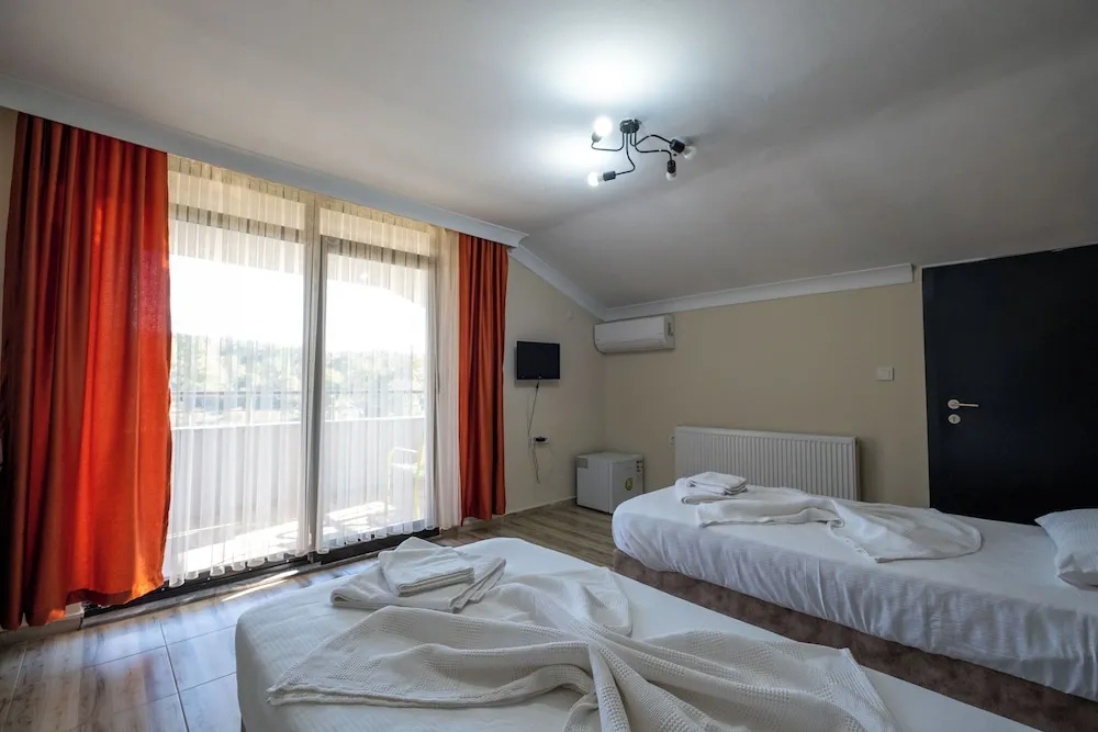 Deluxe Üç Kişilik Oda