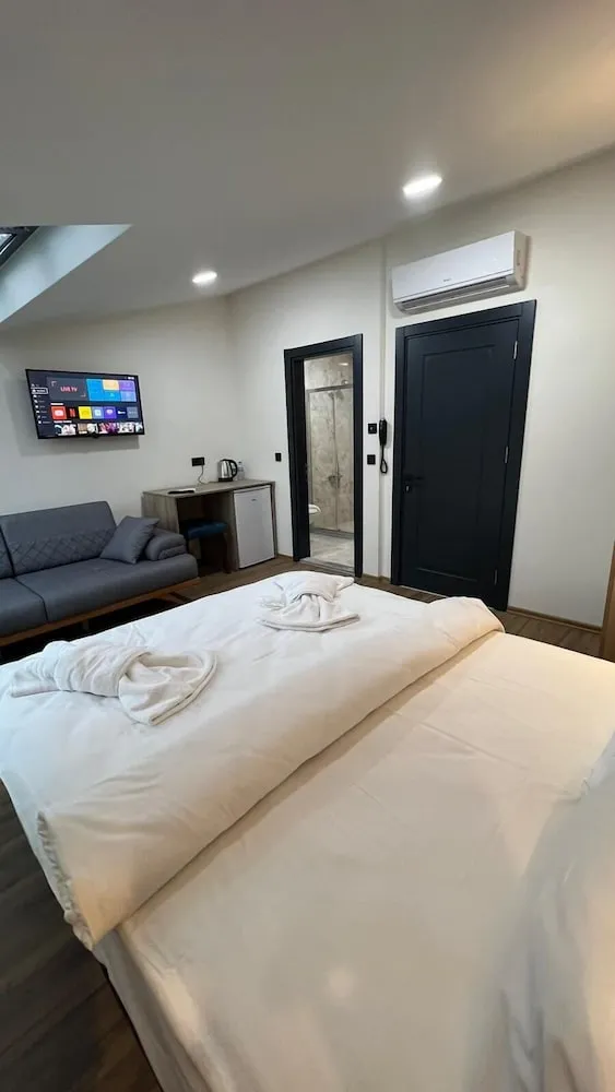 Deluxe Üç Kişilik Oda