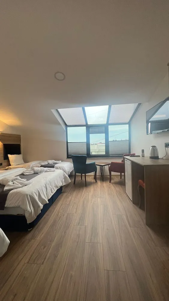 Deluxe Dört Kişilik Oda, Deniz Manzaralı