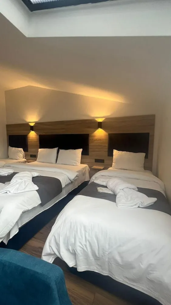 Deluxe Dört Kişilik Oda, Deniz Manzaralı