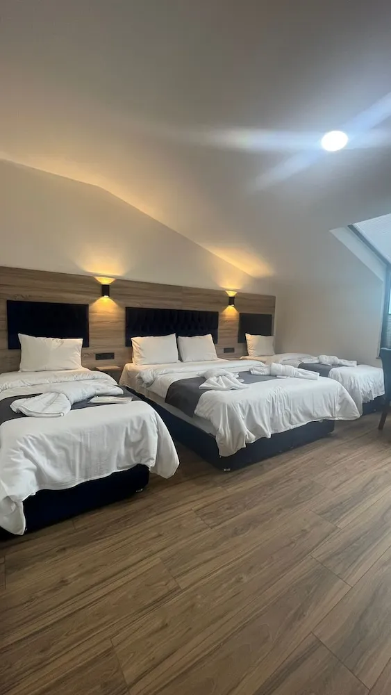 Deluxe Dört Kişilik Oda, Deniz Manzaralı