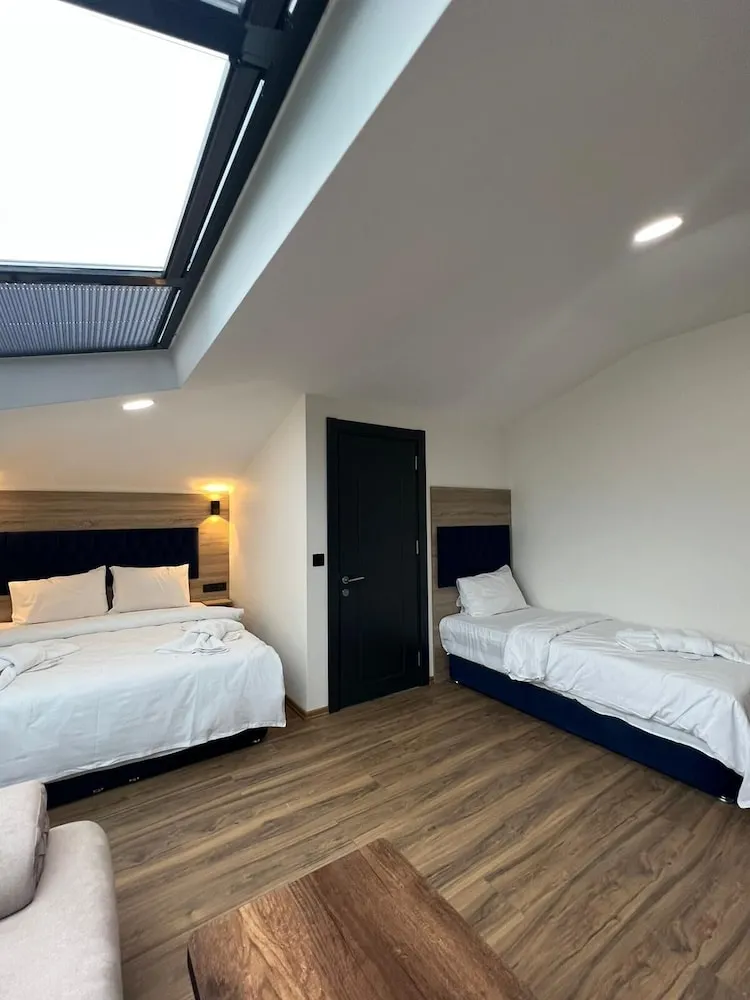 Deluxe Dört Kişilik Oda, Deniz Manzaralı