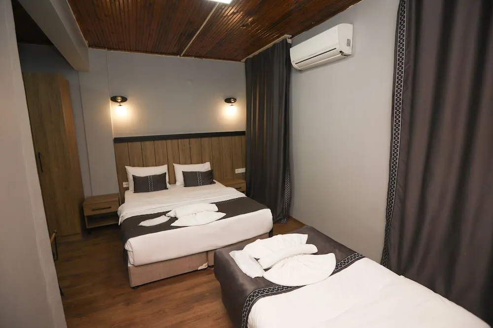 Deluxe Dört Kişilik Oda