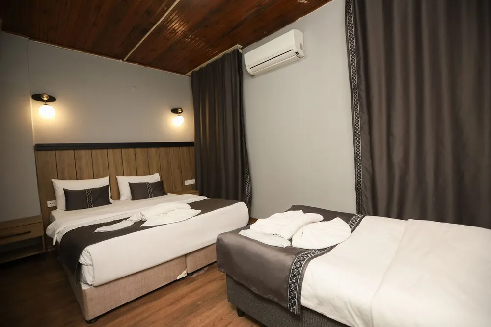 Deluxe Dört Kişilik Oda