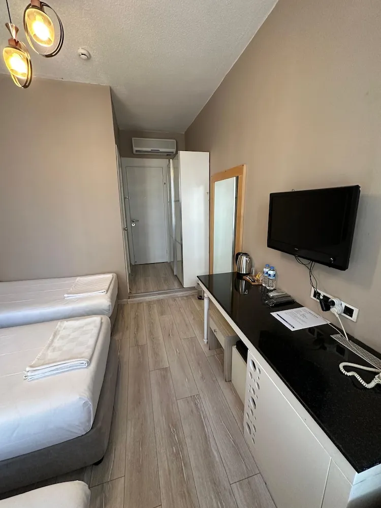 Deluxe Üç Kişilik Oda
