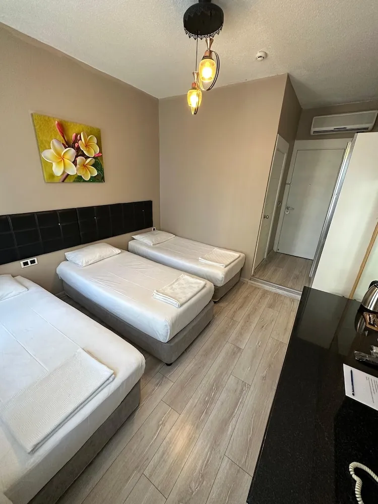 Deluxe Üç Kişilik Oda
