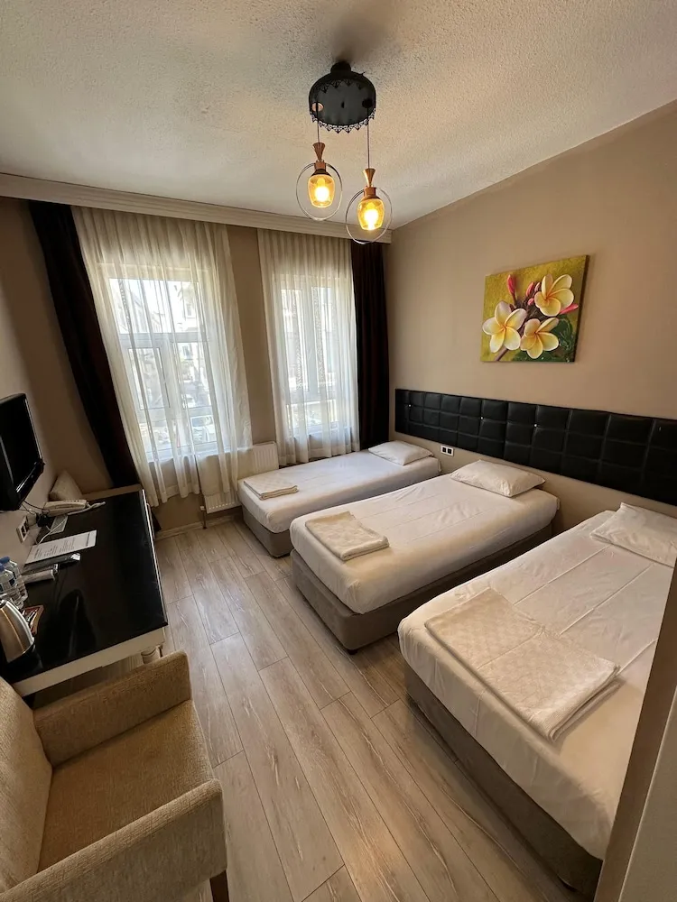 Deluxe Üç Kişilik Oda