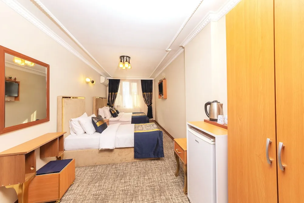 Deluxe Üç Kişilik Oda