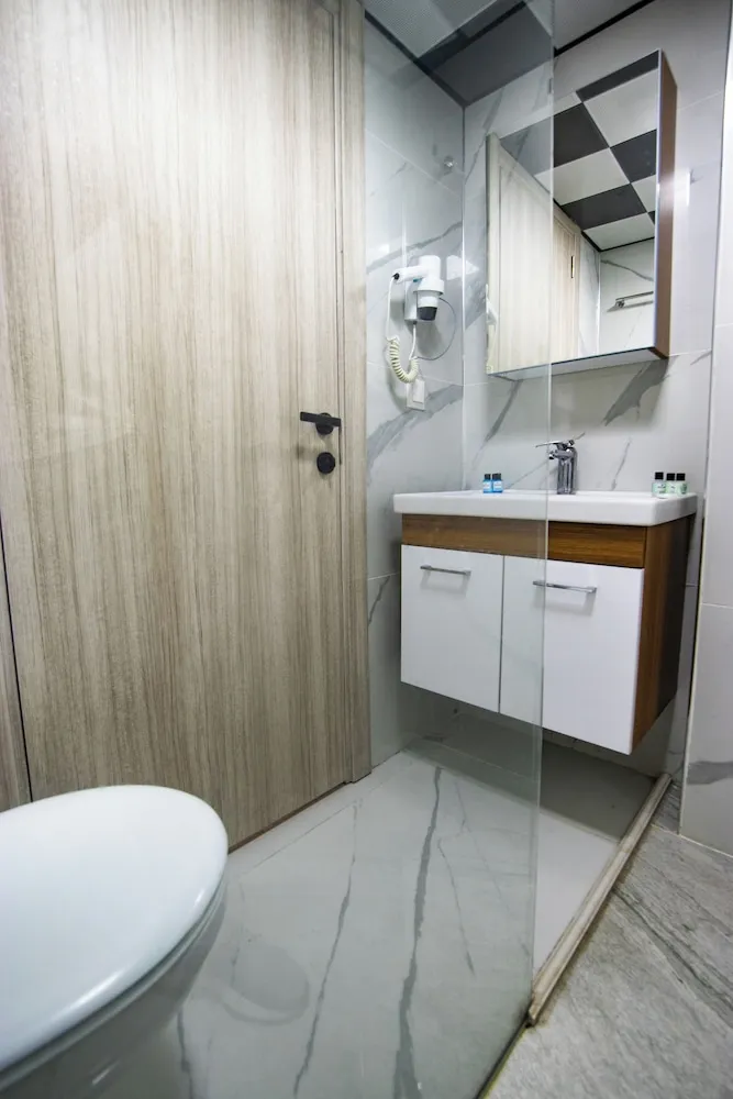 Deluxe Tek Büyük veya İki Ayrı Yataklı Oda, Balkon