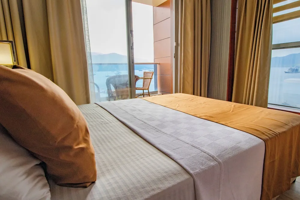 Deluxe Tek Büyük veya İki Ayrı Yataklı Oda, Balkon