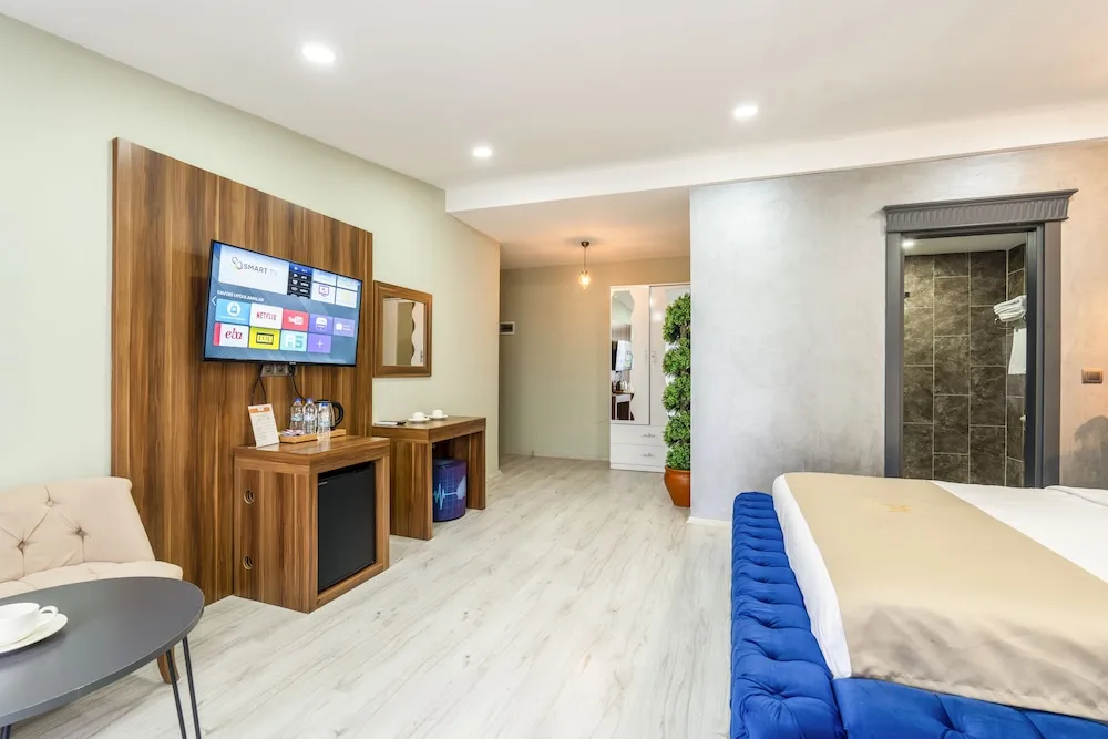 Deluxe Uc Kisilik Oda Balkonlu