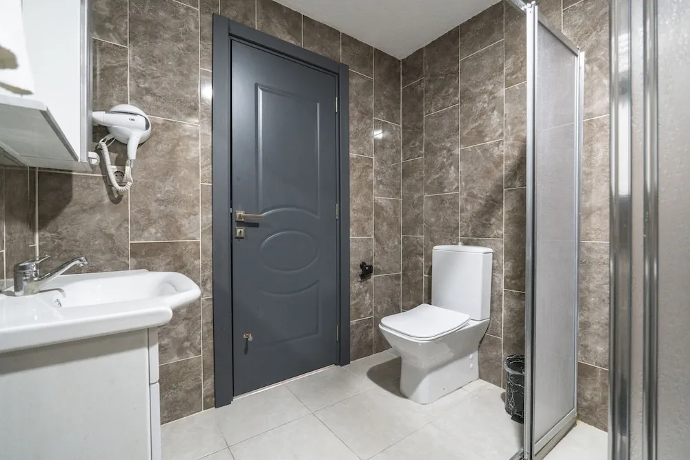 Deluxe Uc Kisilik Oda Balkonlu