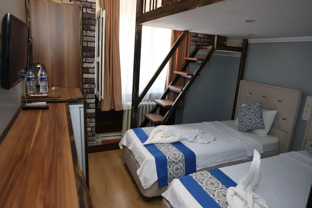 Deluxe Üç Kişilik Oda