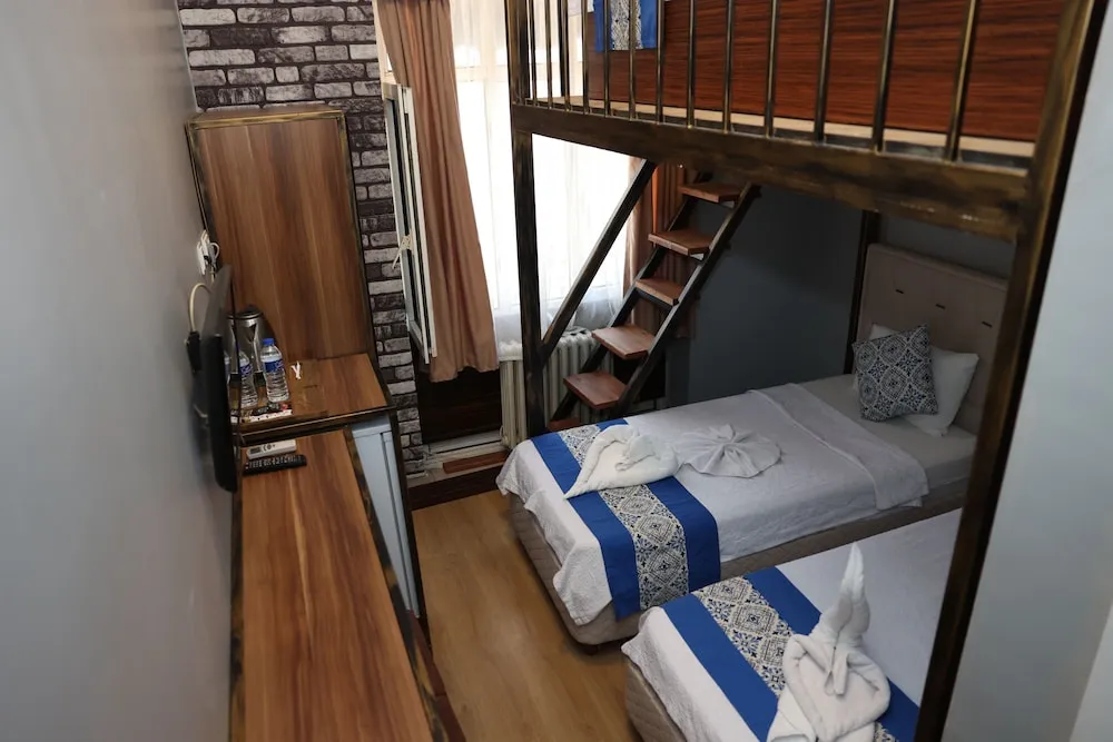 Deluxe Üç Kişilik Oda