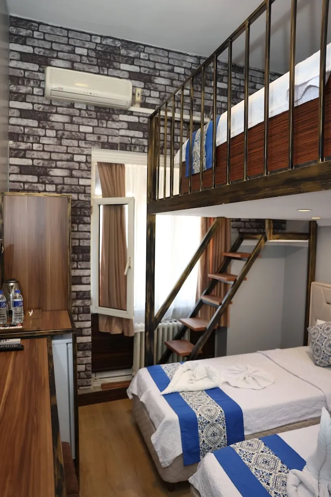 Deluxe Üç Kişilik Oda