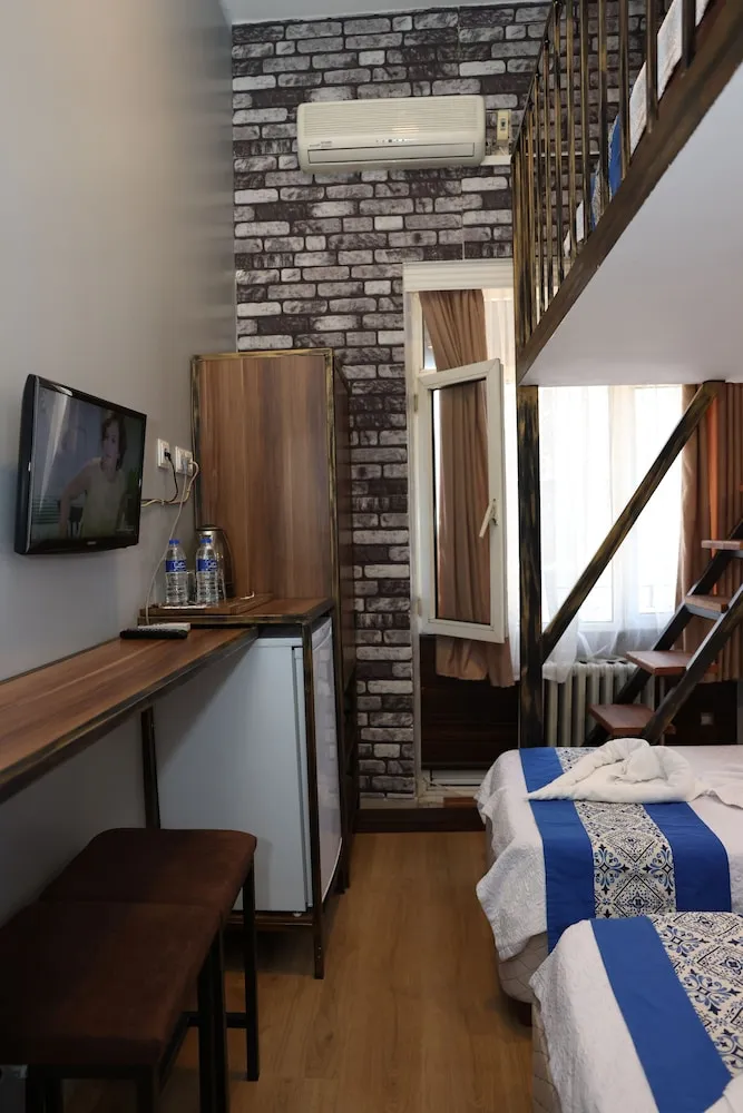 Deluxe Üç Kişilik Oda