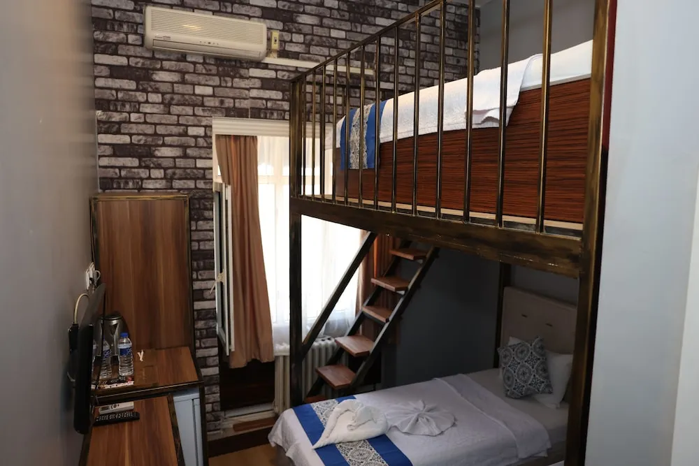 Deluxe Üç Kişilik Oda