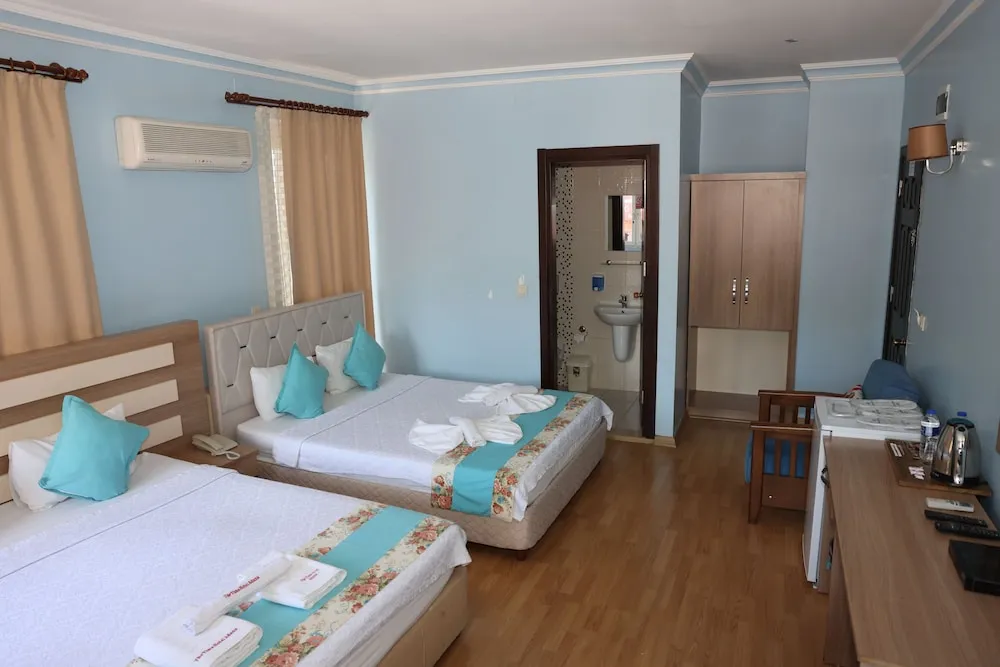 Deluxe Dört Kişilik Oda