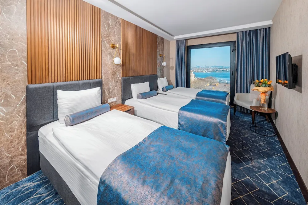 Standard Üç Kişilik Oda, Kısmi Deniz Manzaralı